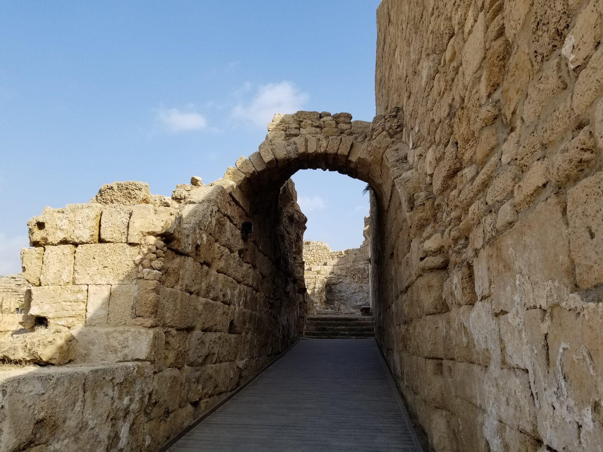 ancient arch at the entrance to the theater in Caesarea